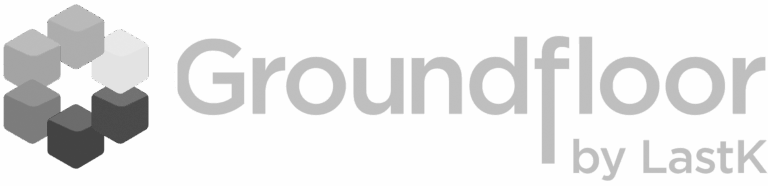 Logo with grey cubes forming a hexagonal shape next to the text "Groundfloor by LastK" in a modern, sans-serif font.